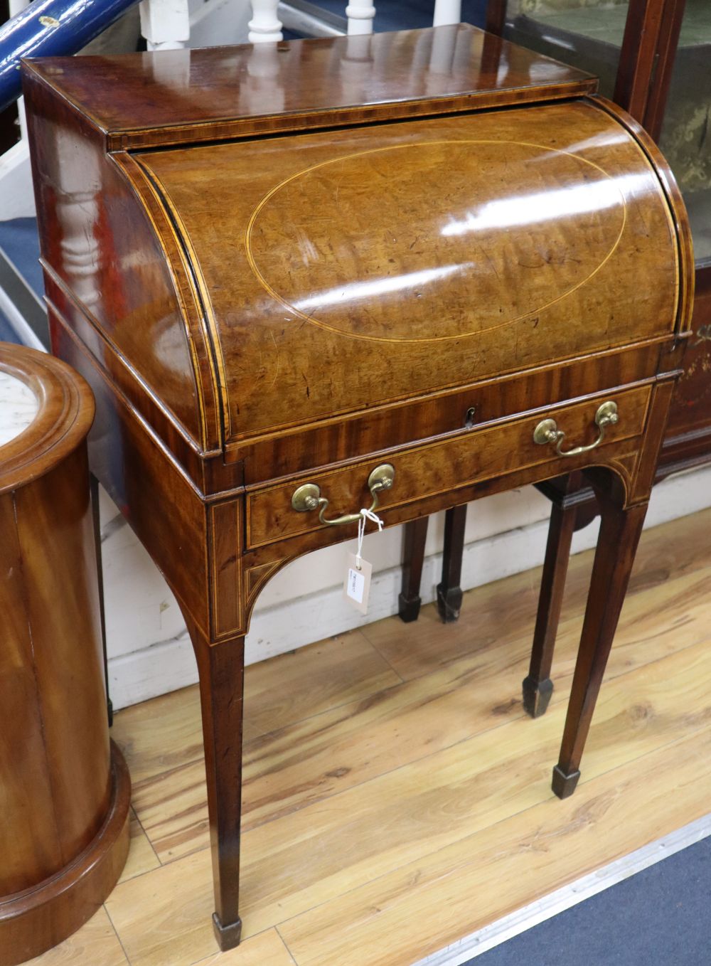 A George III mahogany cylinder front bureau, W.60cm, D.50cm, H.102cm